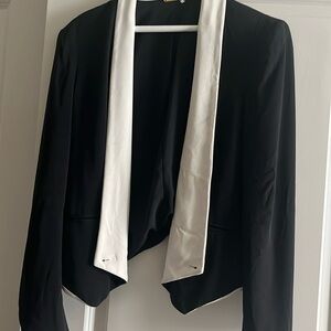 Elegant Black Silk and poly waist length (lined) jacket with tan shawl collar